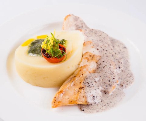 Poularde aux morilles au jus de truffes