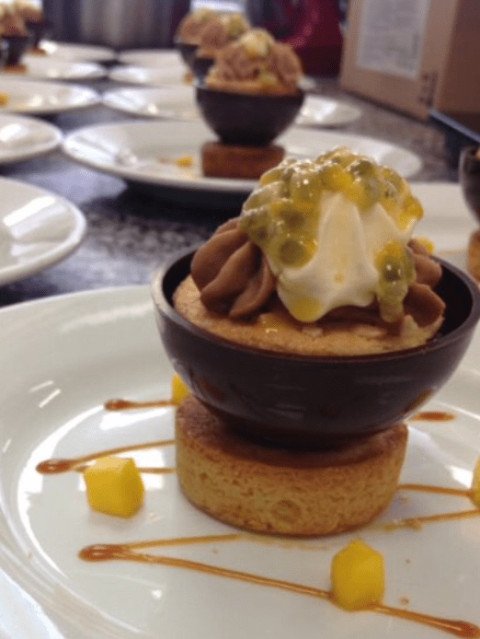 Dôme chocolat noir à la mousse passion