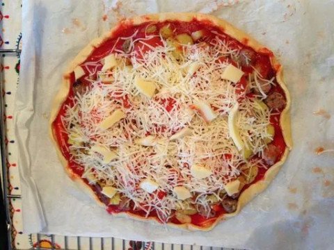 Pizza pomme de terre/chair à saucisse