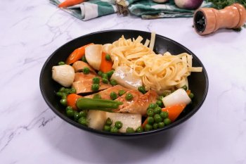 Suprême de poulet au cidre et petits légumes de printemps
