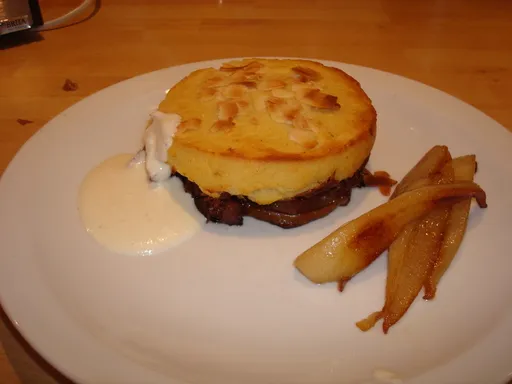 Parmentier de canard aux noisettes et sa crème de parmesan