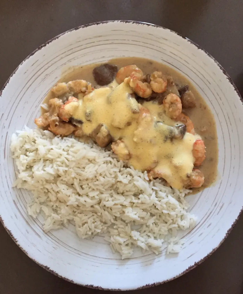 Poêlée de langoustines aux champignons et sabayon de champagne