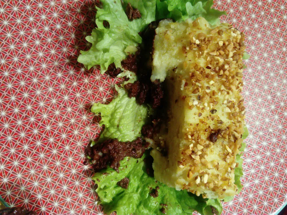 Parmentier de boudin noir au lait de coco et noisettes