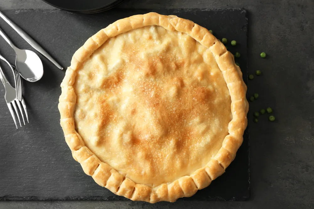 Tourte au saumon, épinards et champignons